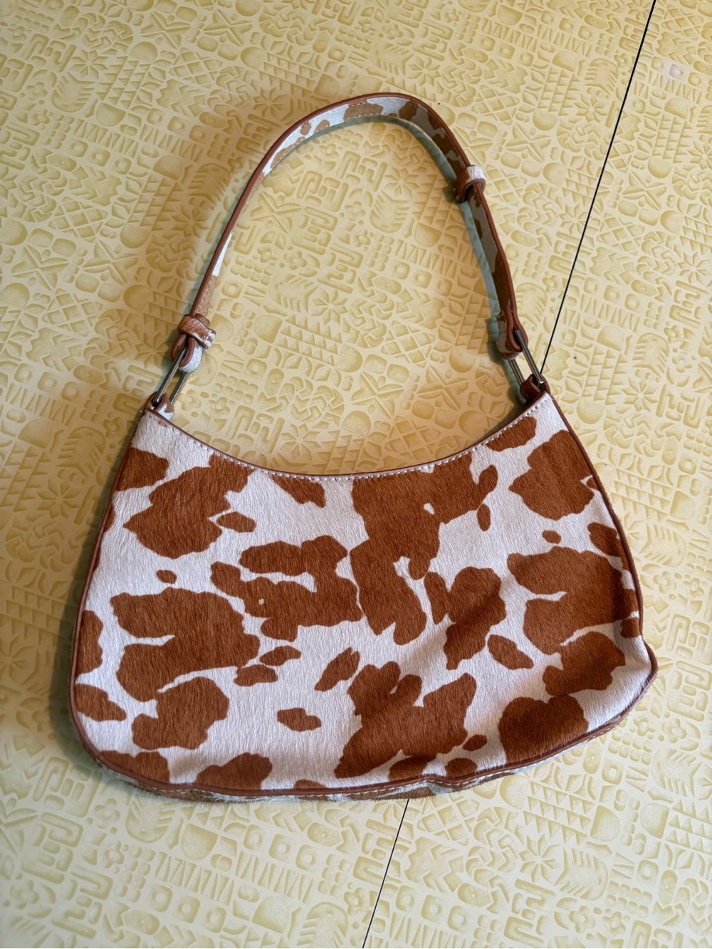 Urban Outfitters Brown and White Cowhide-Print Shoulder Bag